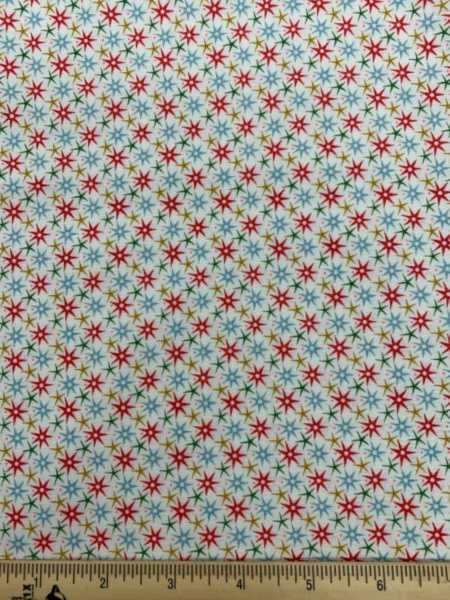 Wish quilting fabric from a festive collection by Liberty of London uk