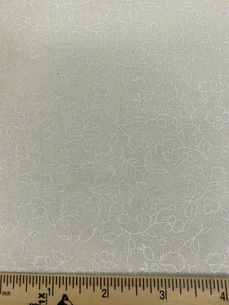 White line drawn floral pattern on a cream background quilting fabric