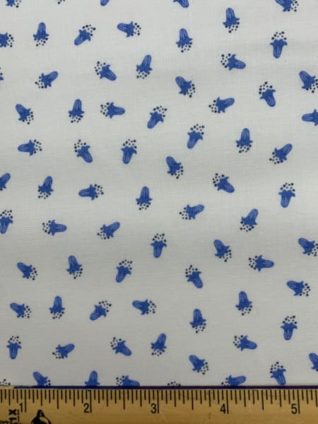 Scattered bluebells on Cream quilting fabric from Lewis and Irene UK