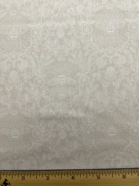 Queen Bee cream on taupe quilting fabric from Lewis and Irene UK