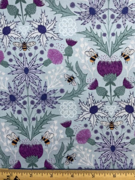 Mirrored Bee on Pale Aqua quilting fabric from Lewis and Irene UK