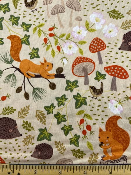 Squirrels and Hedgehogs on Light Oak quilting fabric from Lewis and Irene UK