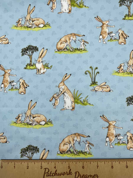 Floral Blue Brown Hare quilting fabric from the Guess How Much I Love you Range by Clothworks