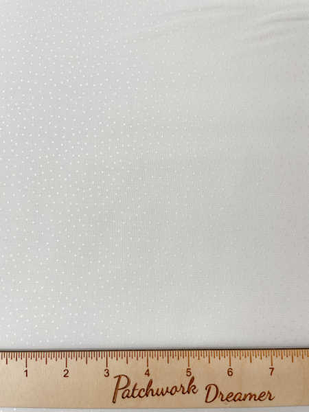 Pearl dots on cream quilting fabric from winter botanical from Lewis and Irene UK