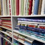 Shelves of cotton quilting fabric UK