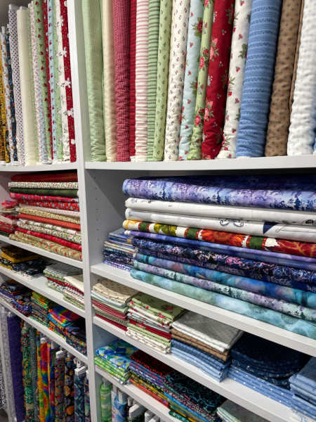 Shelves of cotton quilting fabric UK