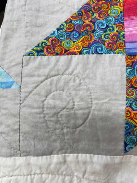 Hand quilting using a stencil