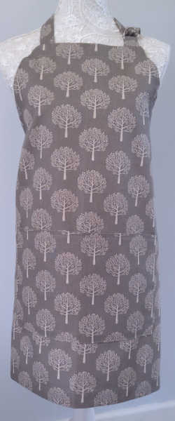Apron in a natural colour with cream Trees on