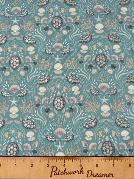 Sea Turtle Family on Ocean Blue with Pearl quilting fabric from Lewis and Irene UK
