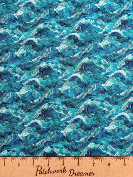 Ocean waves in turquoise quilting fabric from the Atlantis collection by QT fabrics UK