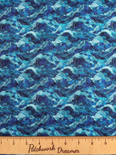 Ocean waves in deep blue quilting fabric from the Atlantis collection by QT fabrics UK