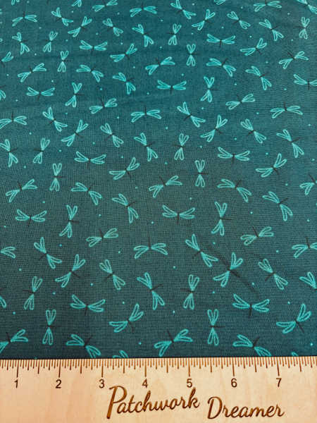 Dragonfly on dark teal quilting fabric from On The Lake by Lewis and Irene UK
