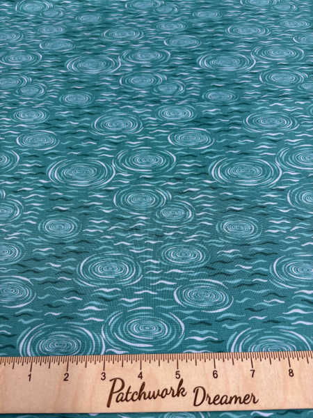 Lake ripples on dark turquoise quilting fabric from On The Lake by Lewis and Irene UK