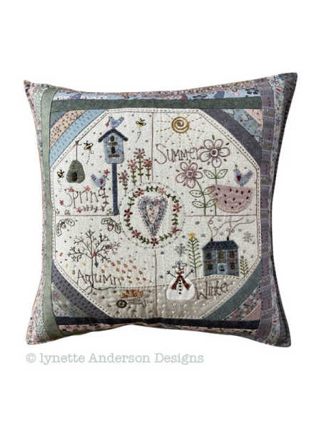 Lynette Anderson All Seasons Pillow pattern featuring embroidery, appliqué, and patchwork designs for spring, summer, autumn, and winter