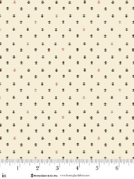 Fancy Fleur de Lis in Cream quilting fabric by Kim Diehl for Henry Glass UK, with brown and pink fleur de lis motifs on a cream background.