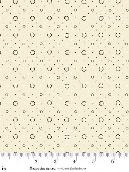 Rings and Things in Cream quilting fabric by Kim Diehl for Henry Glass UK, featuring scattered black and neutral ring motifs on a cream background.