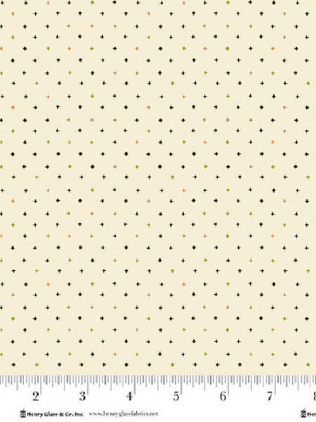 Star Sprinkles in Cream quilting fabric by Kim Diehl for Henry Glass UK, featuring tiny stars in black, green, gold, and orange on a cream background.