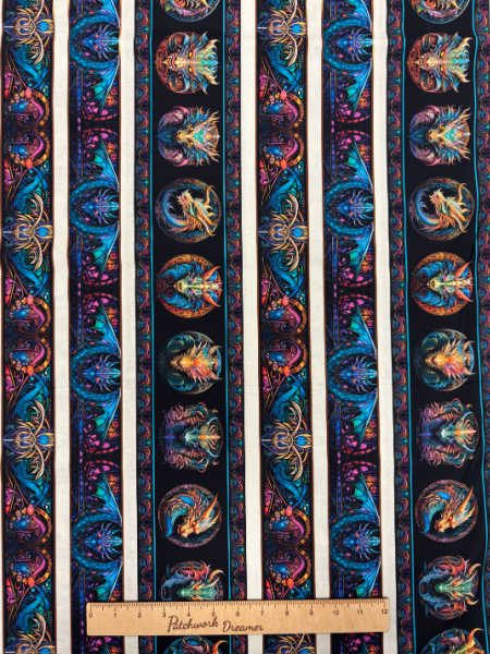 Dragons Song border stripe fabric by Quilting Treasures UK with vertical rows of dragon medallions and fantasy motifs in jewel tones.