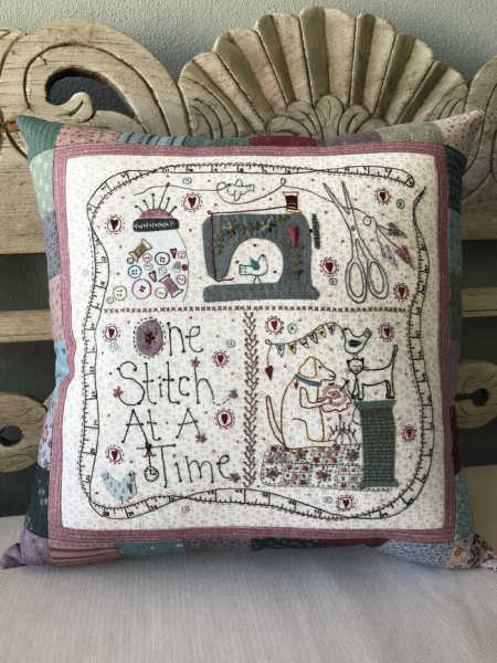 Lynette Anderson One Stitch at a Time Pillow pattern featuring embroidery of a sewing machine, mouse, and friends