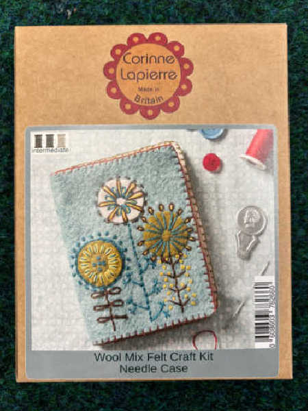 Corinne Lapierre Needle Case Felt Kit showing a felt needle case decorated with embroidered flowers in yellow, blue, and brown tones.