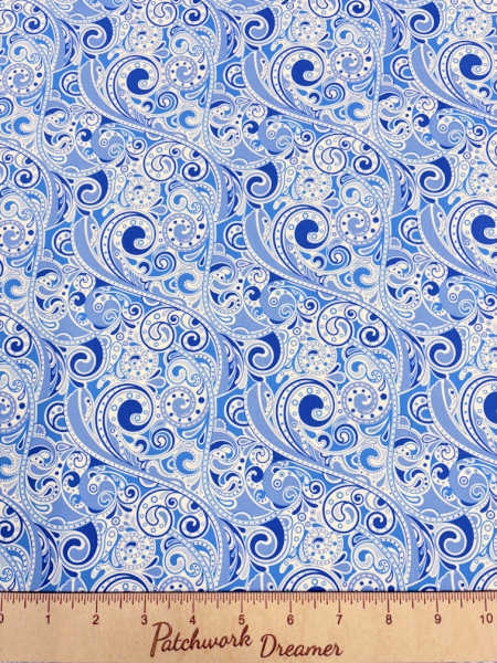 Wonders of the Ocean waves quilting fabric by Jason Yenter for In the Beginning Fabrics UK, featuring blue and white swirling zentangle-style wave designs.