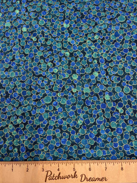 Northcott UK Shimmer Basics Multi Dot Lagoon — teal and blue metallic dot quilting fabric.