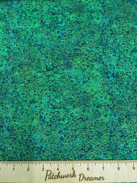 Northcott UK Shimmer Basics River Rocks in Peacock — teal and green metallic pebble-texture quilting fabric.”