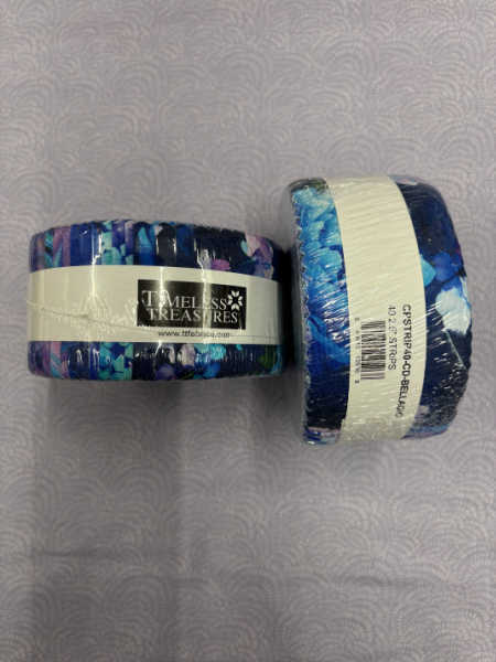 Timeless Treasures UK Bellagio 2.5" strip roll with coordinated blue, purple, and aqua prints.
