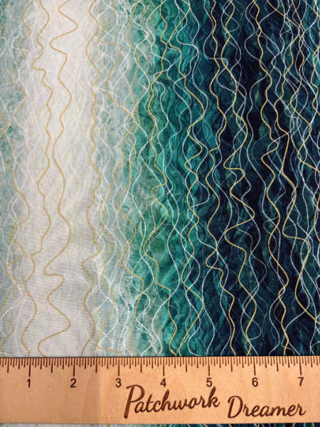Robert Kaufman Hill Shine Teal fabric – wavy vertical stripes in white, aqua, teal and deep blue with metallic accents (UK).”