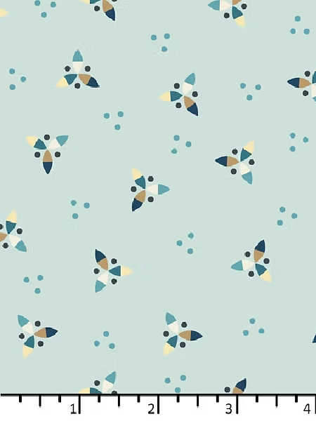 Frosty blue nautical quilting fabric with propeller motifs in blue and teal from the Sands of Time collection by EQP Textiles UK.