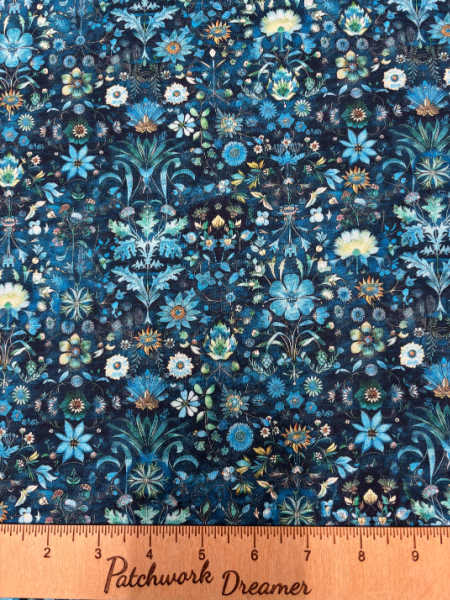 Folklore floral quilting fabric by Quilting Treasures UK with blue, teal and gold botanical design