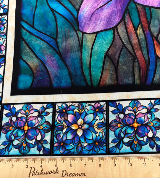 Mosaic Blooms quilting fabric panel border detail with repeated mosaic floral blocks in blue and teal