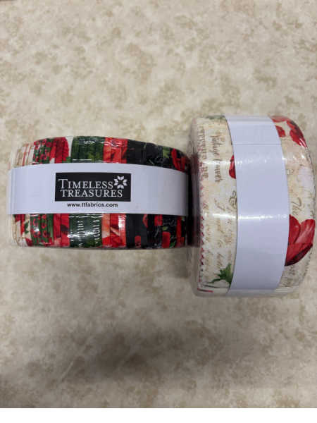 Poppy Passion jelly roll by Timeless Treasures with 40 quilting fabric strips featuring red poppies on black, cream and green backgrounds.