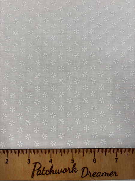 White fabric with tiny floral ditsy pattern Gail Pan Henry Glass Friendship Garden UK