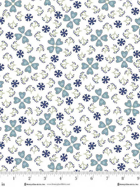 Blue floral and pinwheel fabric on white background by Henry Glass UK