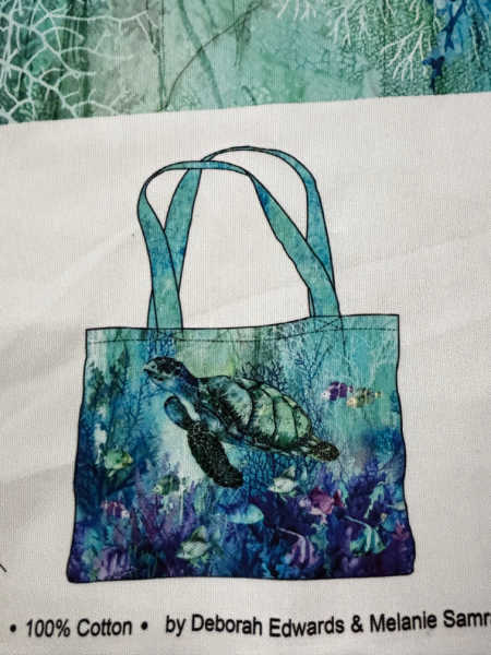 Illustration of finished Coral Reef by Northcott sea turtle tote bag on cotton canvas panel