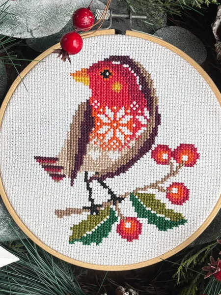Love Poppet UK festive robin counted cross stitch design with red berries and green leaves
