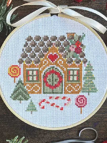 Love Poppet UK gingerbread house counted cross stitch design with sweets and Christmas trees
