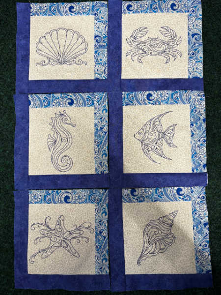 Summer by the Shore Mini Quilt with six coastal embroidery designs