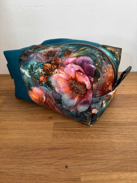 Large Densa Dopp Kit bag made from teal and floral water-resistant cotton