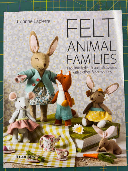 Felt Animal Families by Corinne Lapierre craft book front cover with handmade felt rabbits, fox and mice