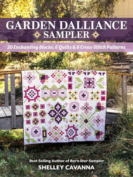 20 Enchanting Blocks, 6 Quilts & 6 Cross-Stitch Patterns by Shelley Cavanna book cover