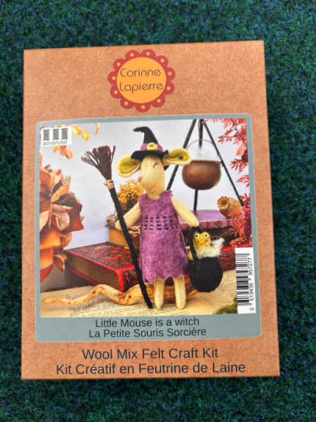 Corinne Lapierre Little Mouse is a Witch felt kit showing a mouse in a purple dress and black witch’s hat with a broom and cauldron.